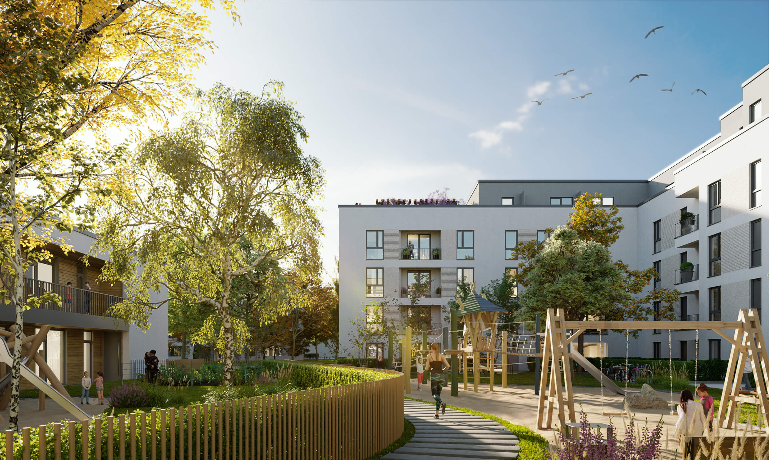 Innenhof einer modernen Wohnanlage mit Spielplatz, B�umen und spielenden Kindern bei Sonnenschein